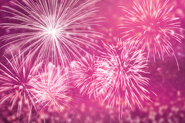 Wall Mural - pink fireworks at celebrate and copy space.