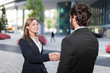 © Minerva Studio - Business people shaking hands