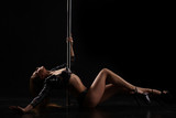 Dancing for adults. Image of sexy pole dancer
