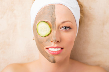 Woman taking care of her face in spa treatments