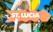 St Lucia direction sign with palm trees