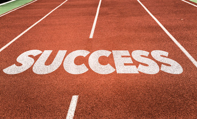 Wall Mural - success written on running track