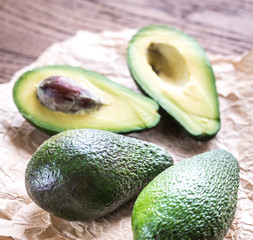 Poster - Avocado on the wooden background