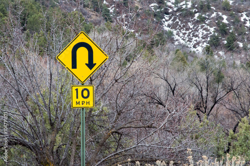 Yellow Hairpin Turn Caution Sign Buy This Stock Photo And