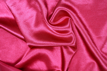 Curved design on red silk for pattern and background