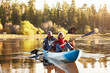 © Monkey Business - Senior African American Couple Rowing Kayak On Lake