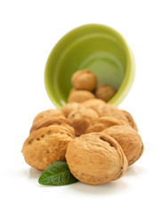 Wall Mural - walnuts in bowl on white