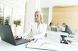 © BGStock72 - Young woman working in the office