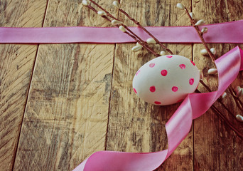 Wall Mural - Easter background with egg and pink ribbon