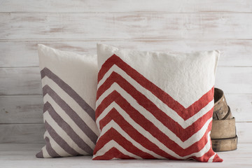 Two Front-Facing Throw Pillows with Chevron Design