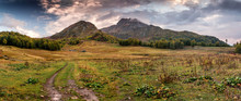 Ridge In Krasnaya Polyana, Sochi Area In Autumn And The Dirt Road At The Foot Of The Mountain