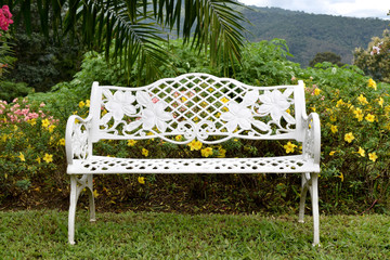 White  public chairs on park garden