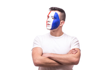 Side portrait football fan confident without emotion of France national team. Crossed hands  on white background. UEFA EURO 2016 football fans concept.