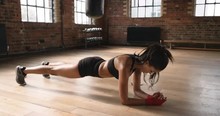 Plank Workout For Fitness Woman At The Gym