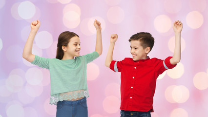 Poster - happy boy and girl celebrating victory