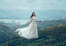 The Girl In Transparent Dress With Long Flying Pastel Train Stands On The Top Of The Mountain , Shabby Chic, Boho Style , Fashion Creative Computer Color Rendering