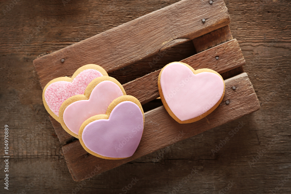 Valentine heart cookies on wooden background