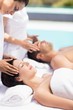 © WavebreakmediaMicro - Couple receiving a head massage from masseur