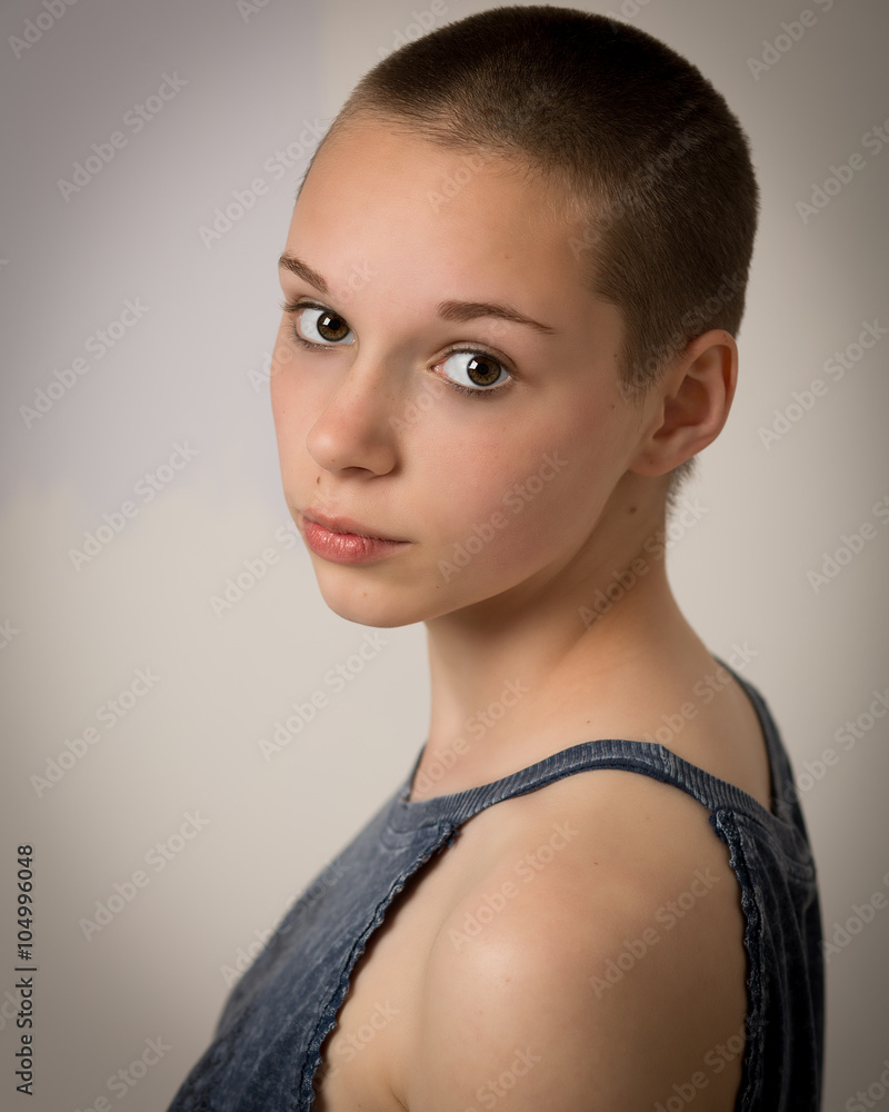 Beautiful Young Teenage Girl With Shaven Head Stock Photo | Adobe Stock