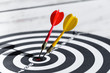 © fotofabrika - darts arrows in the target center