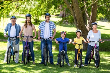 Smiling family with their bikes