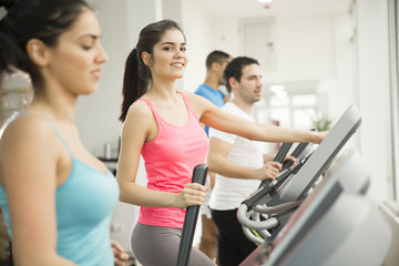 Wall Mural - Young people training in the gym