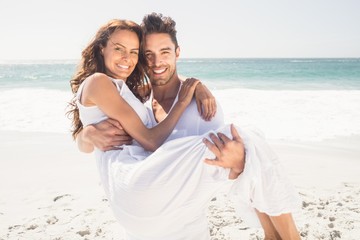 Wall Mural - Boyfriend carrying his girlfriend