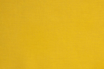 Wall Mural - Close-up of a yellow fabric textile texture