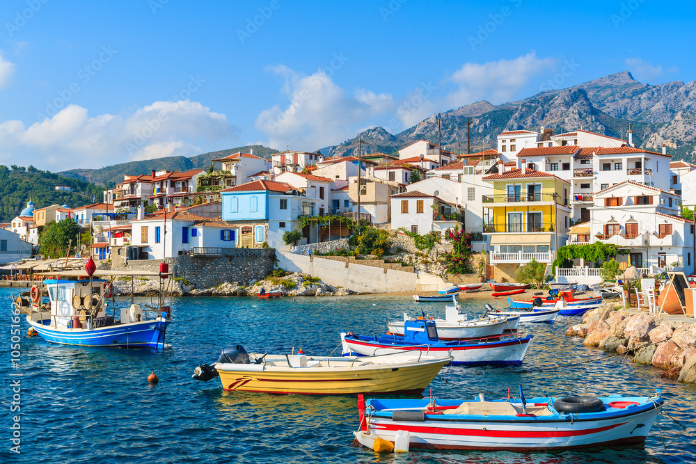 Colorful fishing boats in Kokkari port, Samos island, Greece - obrazy, fototapety, plakaty 