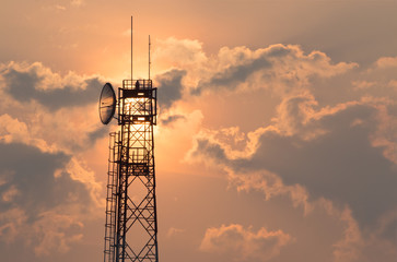 Communication tower at sunrise