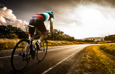 Wall Mural -  Men cycling road bike in the morning