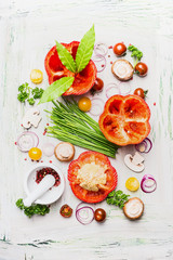 Sticker - Fresh Paprika and ingredient  for cooking on white rustic background, top view. Healthy and clean eating concept.