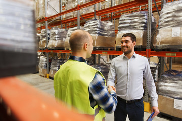 Wall Mural - worker and businessmen with clipboard at warehouse