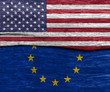 © bank215 - USA and EU flag on wood