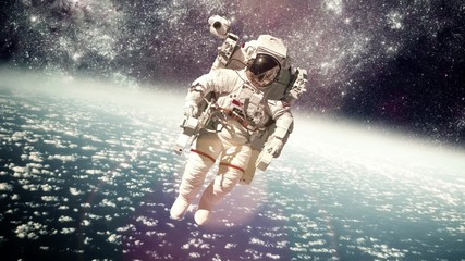 Wall Mural - astronaut in outer space against the backdrop of the planet earth. elements of this image furnished 