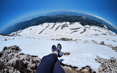 girl hiking .snow on the top of the tahtali mountain in turkey