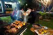 © torwaiphoto - Dinner party, barbecue and roast pork at night