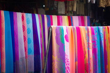 this is a photo of chinese dai people's colorful fabric and cloth, was taken in yunnan, china.