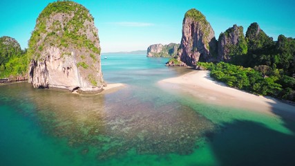 Wall Mural - aerial view on tropical beach (pranang beach) and rocks, krabi, thailand, 4k