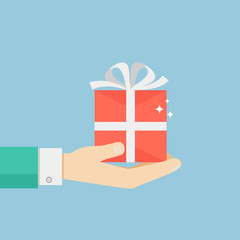 Hand holding or offering gift or present