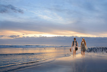 Girls Enjoying Time Together On Beautiful Beach At Sunrise, Daytona Beach, Florida, USA.