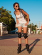 © erainbow - Angelica. rollerblading city!