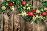 Fototapeta Tęcza - Christmas border from christmas wreath useful as christmas decoration