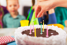 Child On Birthday Party Prepared Blowing Candles On Cake, Selectiv Focus