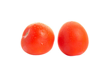 Two red isolated tomatoes with water drops