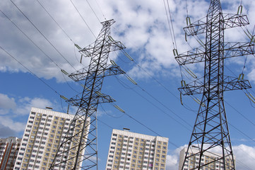 Transmission line against the blue sky