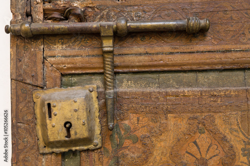 door and lock in the 19th century Bahia Palace in Marrakech Poster