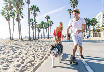 Couple making sport with dog