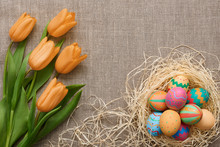 Easter Background,eggs, Yellow Tulips On Sackcloth