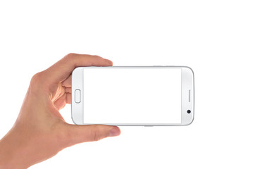 Poster - Modern white smart phone in man hand in horizontal position. White screen for mockup, isolated.
